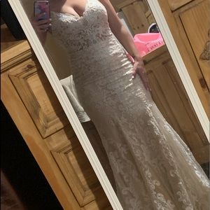 Size 4. Brought and worn once at prom.